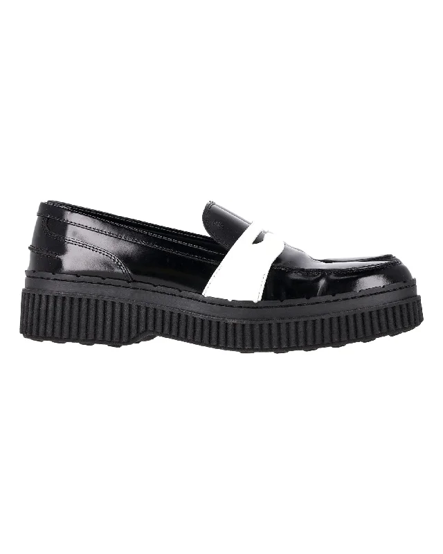 Tod's Platform Penny Loafers in Black Leather