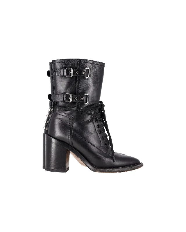 Valentino Garavani Rockstud Double-Buckle Heeled Boots in Black Leather Aesthetic  